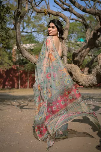 Beige organza floral print/animal print zari border saree with unstitched blouse piece