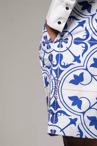 White printed azulejos tile trekker shorts