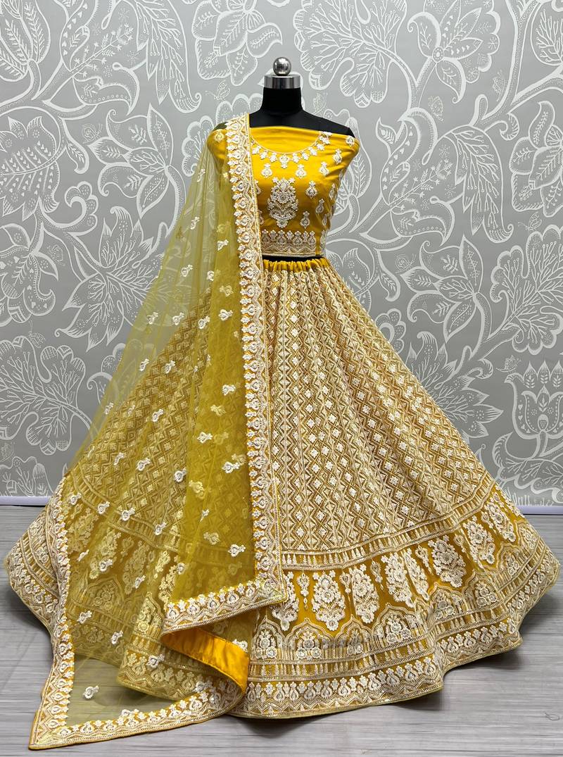 Fancy Haldi Function Sparkling Net Yellow Sequins Designer Lehenga Choli Set