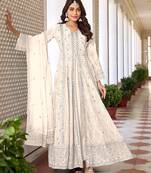 Cream color faux georgette embroidered semi stitched partywear suit
