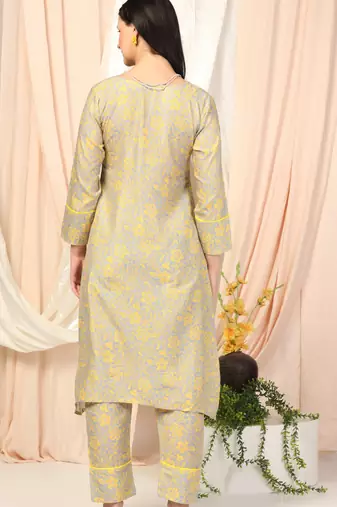 SHADES OF FAASHION Muslin yellow floral suit set.