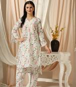 SHADES OF FAASHION Muslin white floral print suit set with lace and pearls.