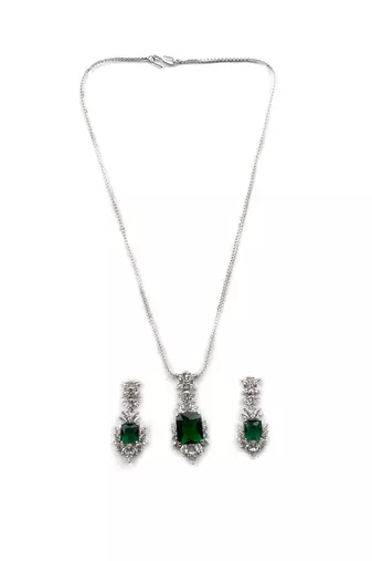 Silver plated green square ad cz studded leaf pendant set with earrings and maangtika