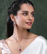 Silver plated red square ad cz studded leaf pendant set with earrings and maangtika