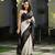 Beige matka silk black taidai jacquard saree