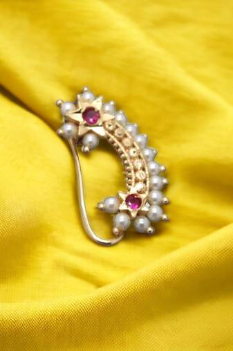 Gilded mosaic: the opulence of gold-plated nose rings with artificial stones and beads