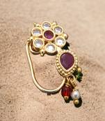 Golden luminary: the radiance of gold-plated nose rings