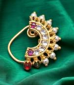 Gilded opulence: the majestic fusion of gold, artificial stones, and beads