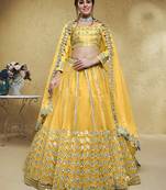 Magnetic Yellow Foil Work Net Haldi Wear Lehenga Choli With Dupatta