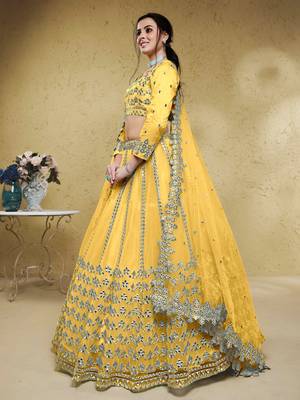 magnetic yellow foil work net haldi lehenga set choli with dupatta with dupatta 2