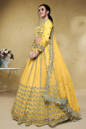 magnetic yellow foil work net haldi lehenga set choli with dupatta with dupatta