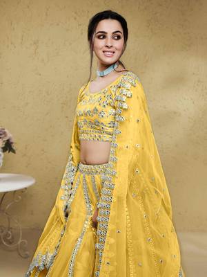magnetic yellow foil work net haldi lehenga set choli with dupatta with dupatta 4