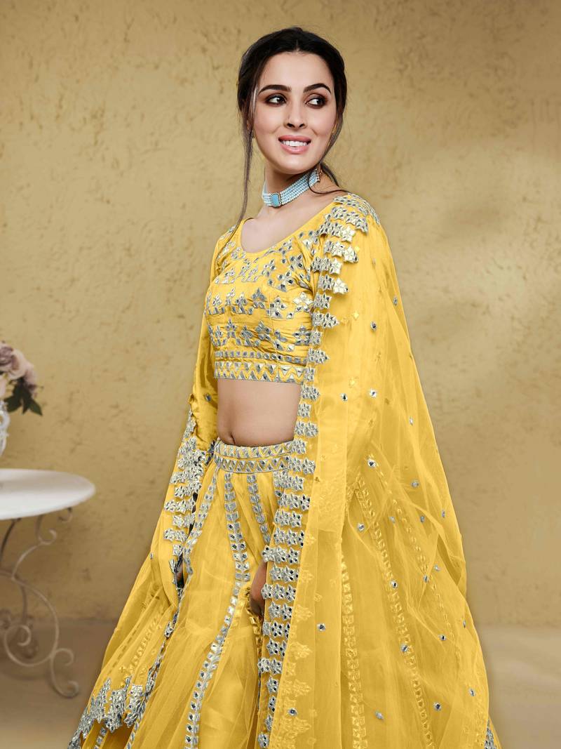 Magnetic Yellow Foil Work Net Haldi Wear Lehenga Choli With Dupatta