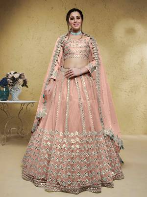fascinating dusty pink foil work net lehenga set choli with dupatta 1