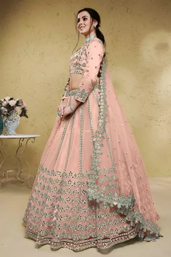 fascinating dusty pink foil work net lehenga set choli with dupatta