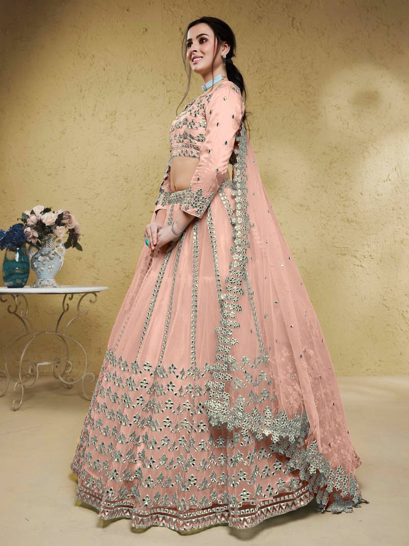 Fascinating Dusty Pink Foil Work Net Bridesmaid Lehenga Choli