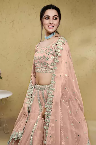 fascinating dusty pink foil work net lehenga set choli with dupatta