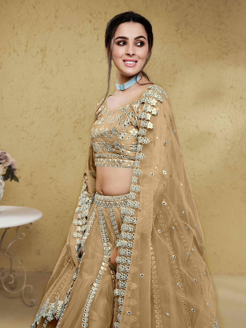 Stunning Beige Foil Work Net Wedding Lehenga Choli With Dupatta