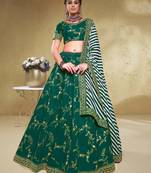 Charming Green Thread Embroidered Silk Mehendi Wear Lehenga Choli