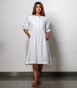 Minimalist white gathered dress