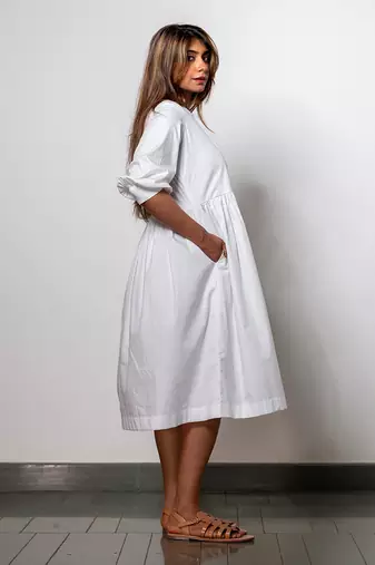 Minimalist white gathered dress