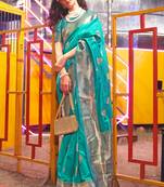 Rama Banarasi silk blend Jacquard Woven Saree With Blouse