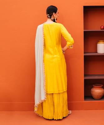 Yellow silk kurta sets 4