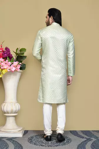Pista embroidered art silk kurta pajama