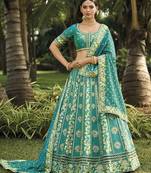 Teal green colour banarasi silk embroidered wedding lehenga