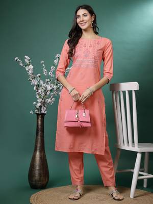 Women peach color embroidery kurta pant set 1