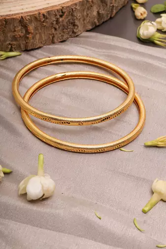Elegant Antique Gold-Plated Bangles with Intricate Detailing