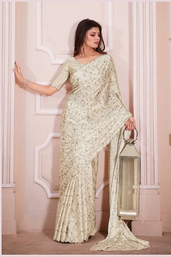 Cream hand work zarkan cut work border satin saree