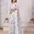 White hand work zarkan cut work border satin saree