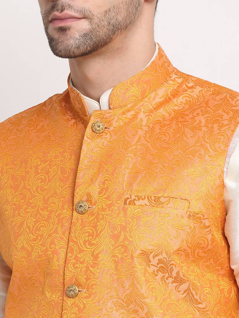 cream silk blend kurta and churidar with jacquard orange nehru jacket