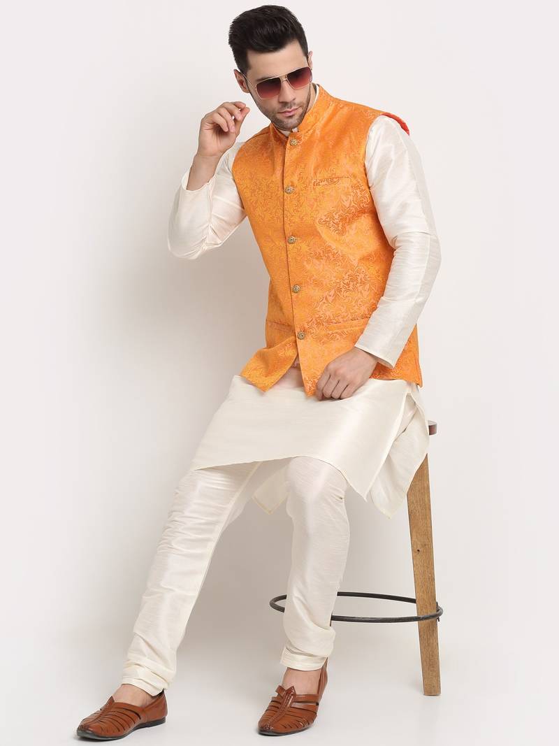cream silk blend kurta and churidar with jacquard orange nehru jacket
