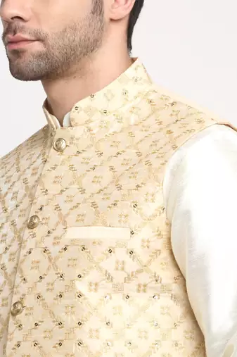 men silk cream kurta churidar with beige embroidered nehru jacket set