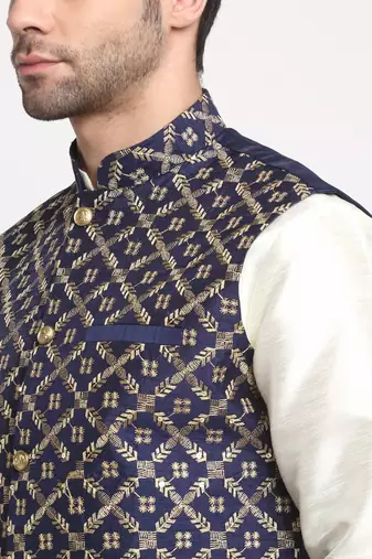 Men Silk Cream Kurta Churidar With Navy Blue Embroided Nehru Jacket Set