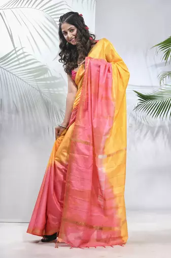 Yellow and flamingo pink silk saree with zari borders