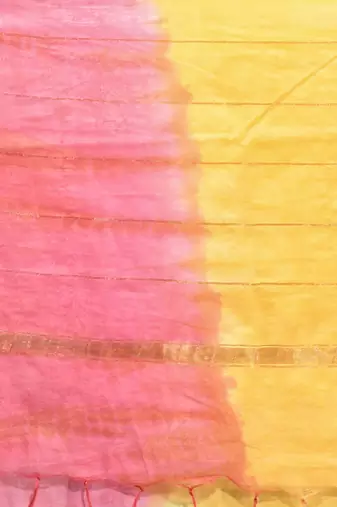 Yellow and flamingo pink silk saree with zari borders