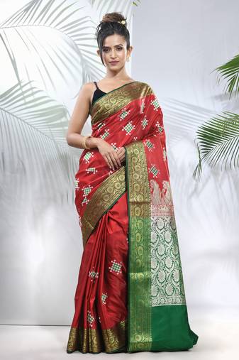 Red embroidered motifs silk saree with zari borders