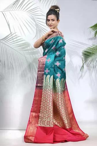 Teal embroidered motifs silk saree with zari borders