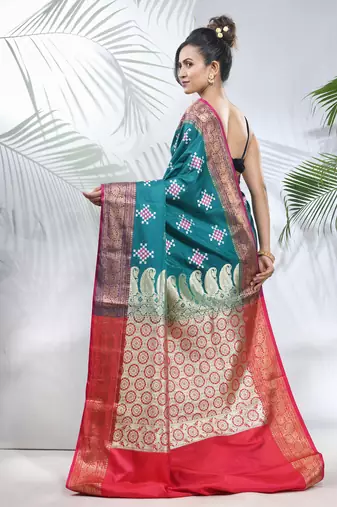 Teal embroidered motifs silk saree with zari borders