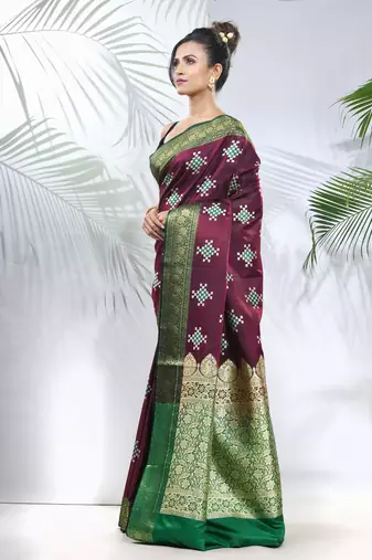 Purple embroidered motifs silk saree with zari borders