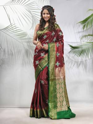 Maroon embroidered motifs silk saree with zari borders 1