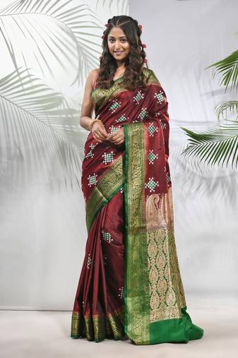 Maroon embroidered motifs silk saree with zari borders