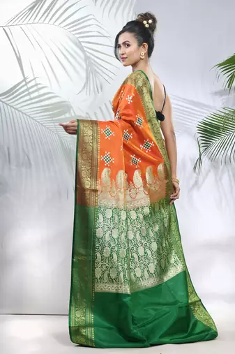 Orange embroidered motifs silk saree with zari borders