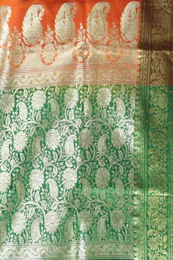 Orange embroidered motifs silk saree with zari borders