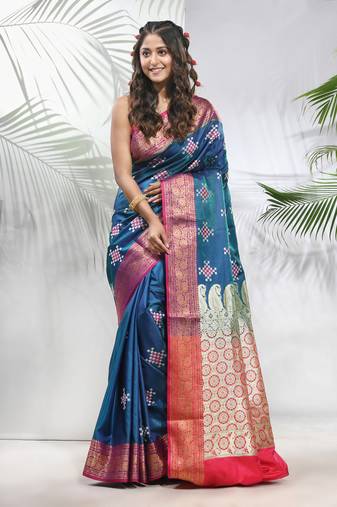 Teal embroidered motifs silk saree with zari borders