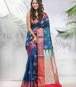 Teal embroidered motifs silk saree with zari borders