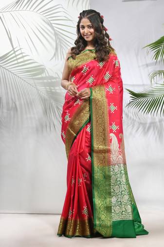 Rani pink embroidered motifs silk saree with zari borders